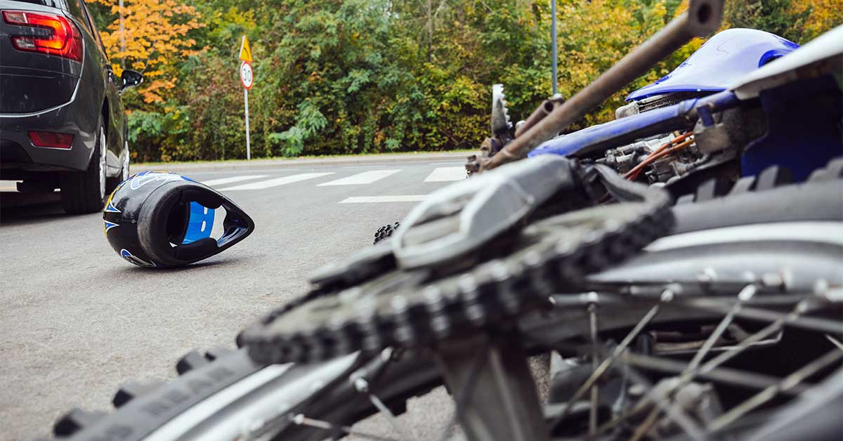 Close-up of the bike and the car on the street