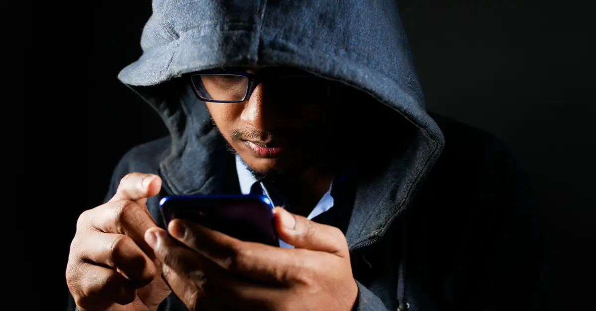 Hacker Hand Stealing Data From Smart Phone